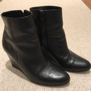 Black wedge booties